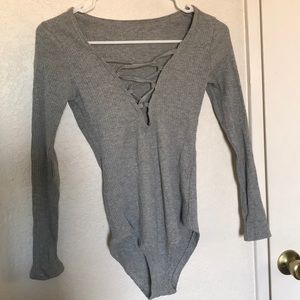 Grey long sleeve body suit